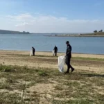 Garda de Mediu Botoșani a curățat malul Prutului pe partea moldovenească